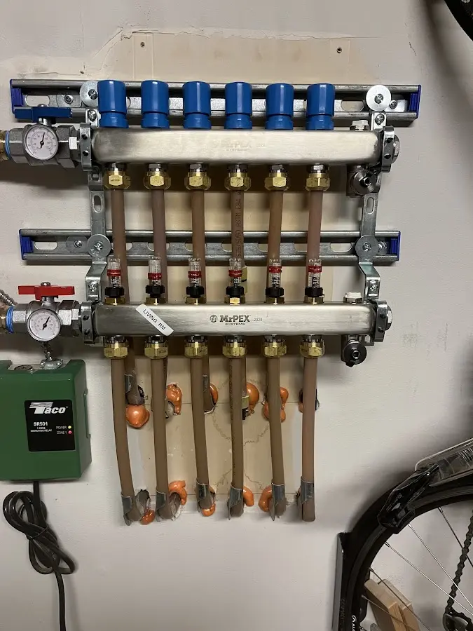 Plumber performing Water Heater Repair at a residential property in Indianapolis